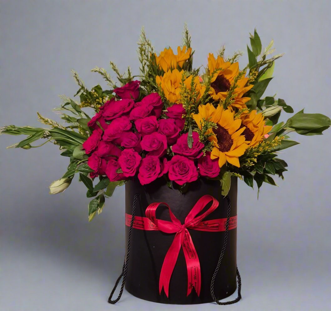 Explore the stunning blend of pink roses and sunflowers, a perfect harmony of passion and joy. Ideal for gifts, events, and special moments.