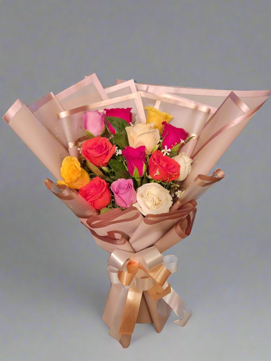 "Stunning floral arrangement of soft pink roses, white-pink carnations, and vibrant pink daisies in a stylish box. Perfect for gifts or special occasions!"