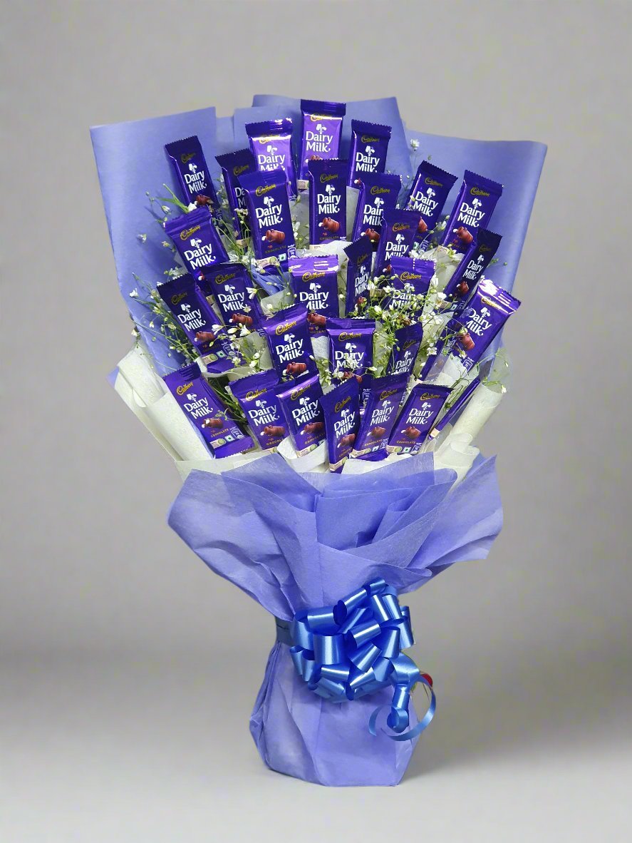 Discover the perfect treat with a blue bouquet inside Dairy Milk chocolate – a blend of elegance and sweetness. Perfect for gifting or indulgence.