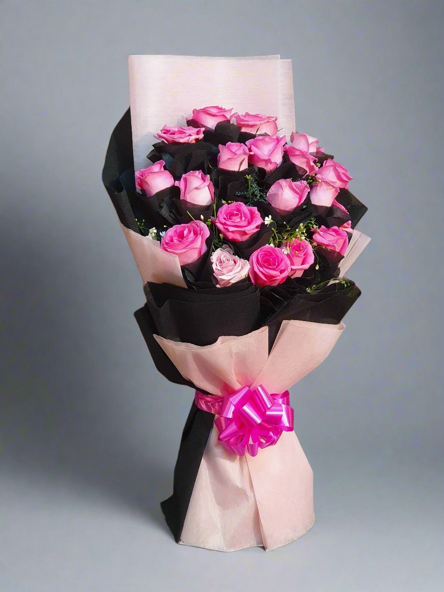 Charming 18 Pink Roses with a Stylish Ribbon Bow