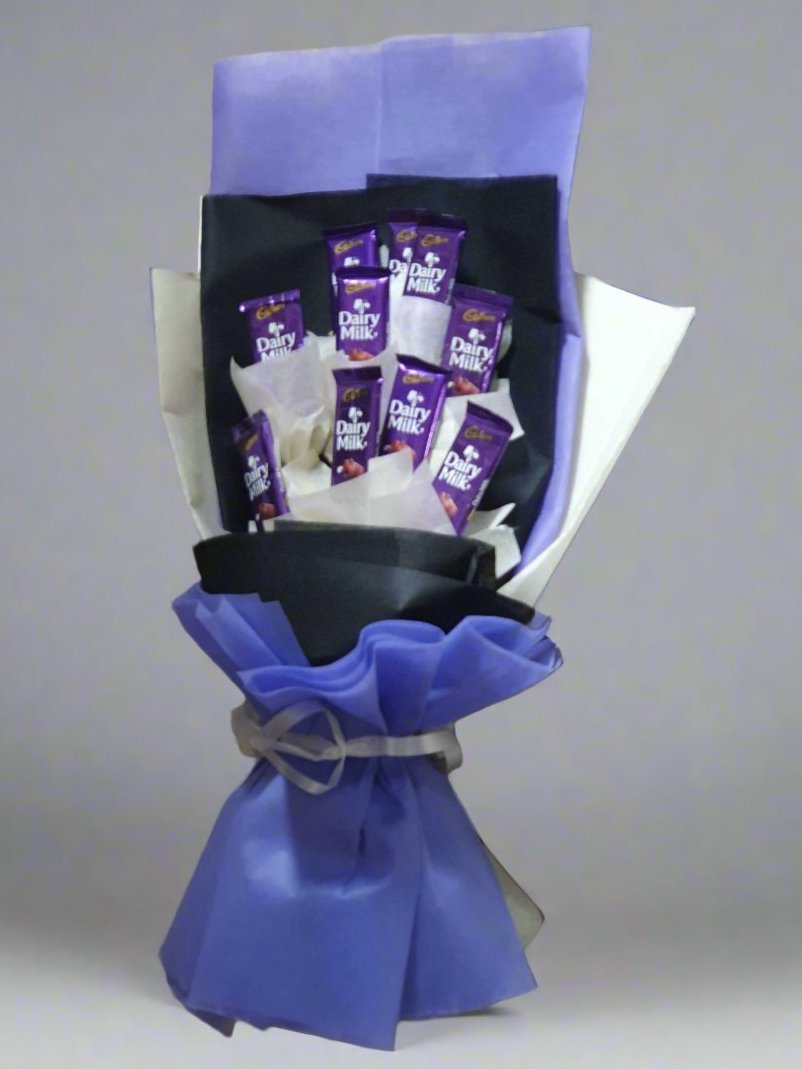 Surprise loved ones with a beautiful white and blue bouquet paired with 10 Dairy Milk chocolates for a delightful gift! Perfect for any occasion.