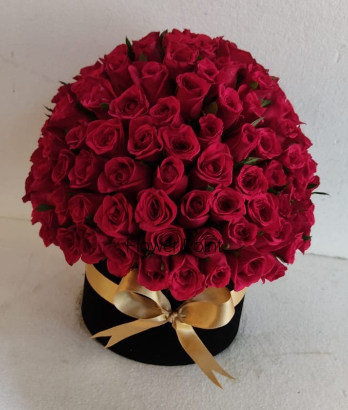 Gift a stunning bunch of red roses in a beautiful round box, perfect for expressing love and celebrating special moments. Order now for any occasion!