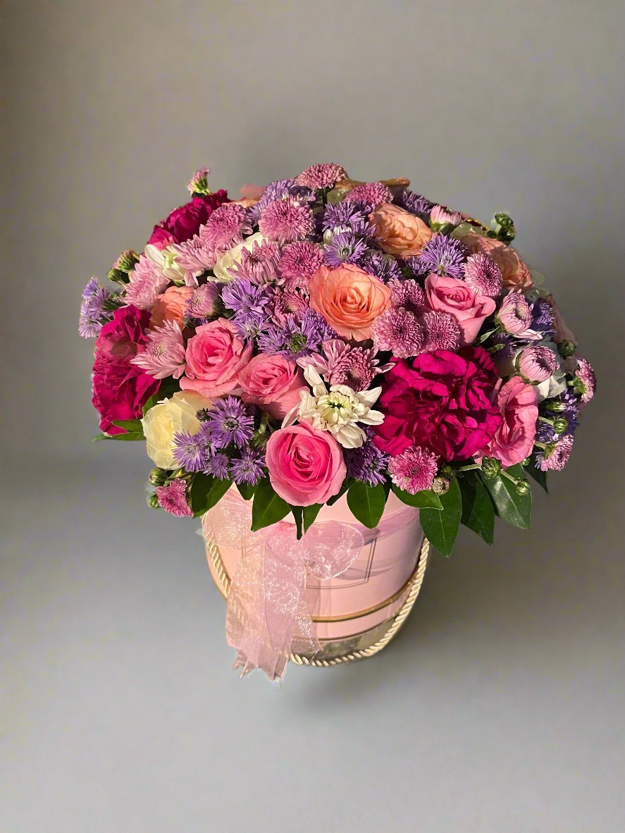 Gift a beautiful mix of carnations, roses and daisy in a box. Perfect for birthdays, anniversaries, or any celebration. Order now for a vibrant surprise