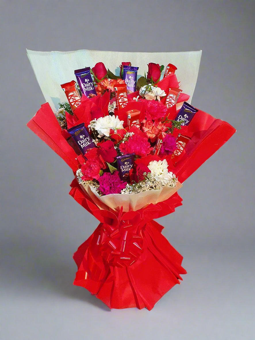 Celebrate love with a red bouquet paired with Dairy Milk chocolates, blending elegance and sweetness for unforgettable gifting moments.