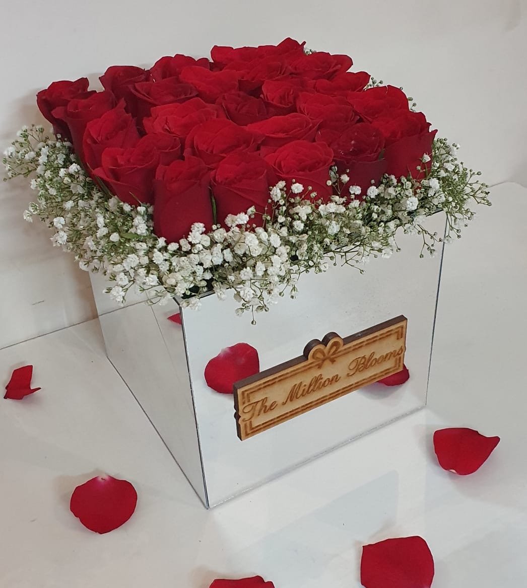 Celebrate love with Million Blooms red roses arranged in a box. Perfect gift for any occasion, filled with elegance and beauty.