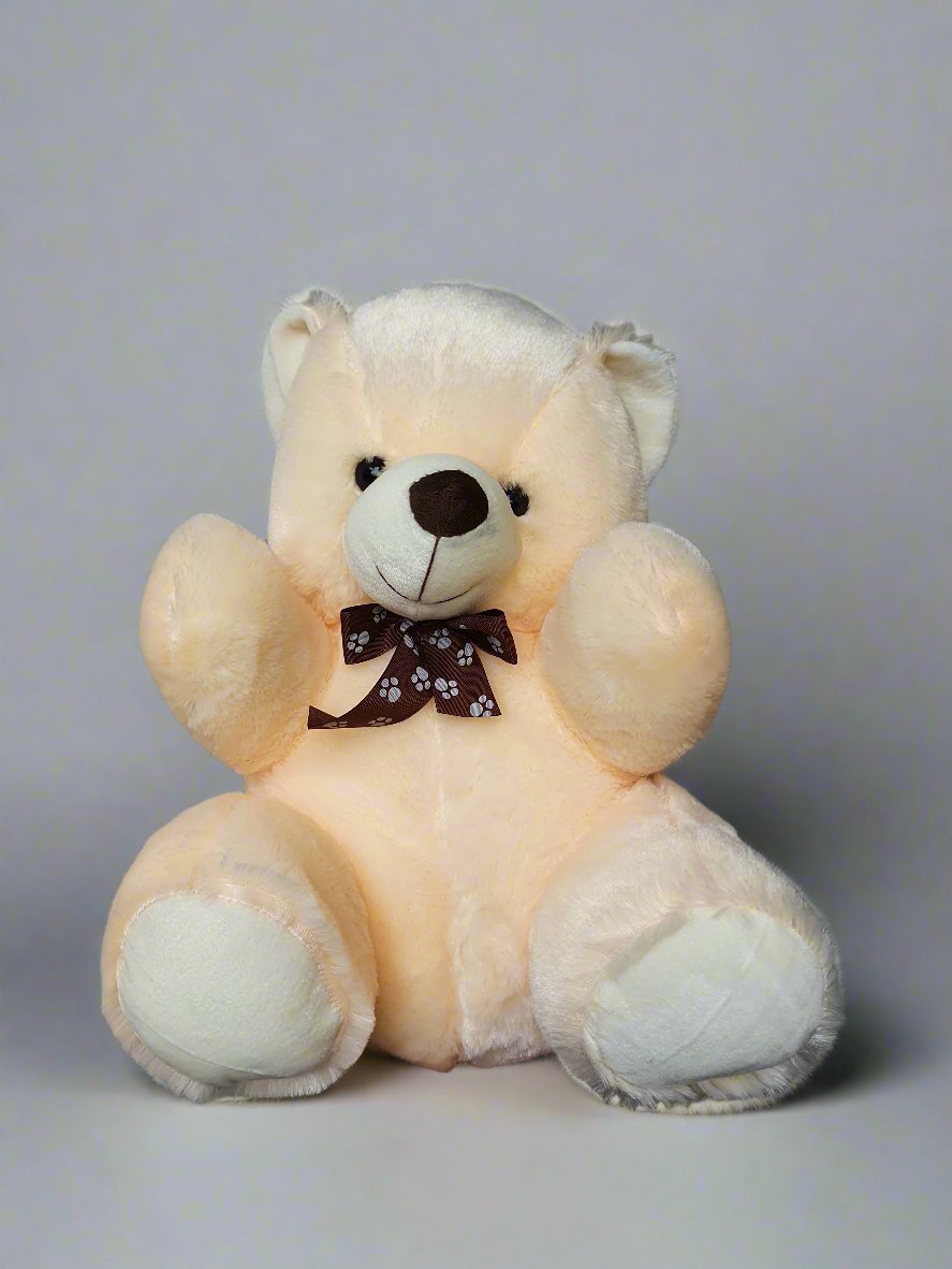 Discover the charm of a white and yellowish teddy bear, perfect for cuddles, warmth, and comfort. Ideal for gifting and adding cheer to any space.