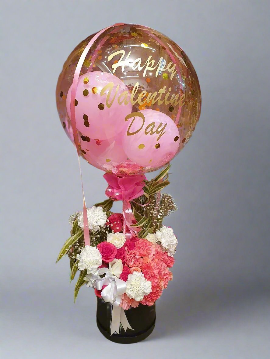 Delight your loved ones with a cheerful combo of balloons and fresh flowers. Perfect for making birthdays unforgettable